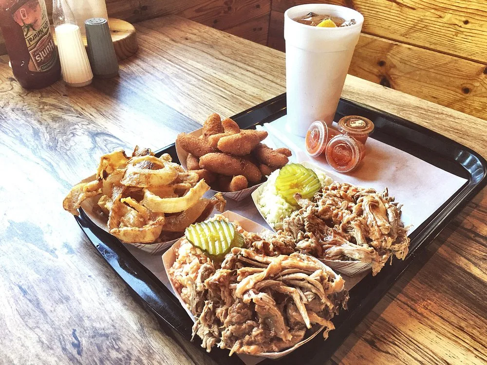 BBQ trays with sweet tea and hushpuppies