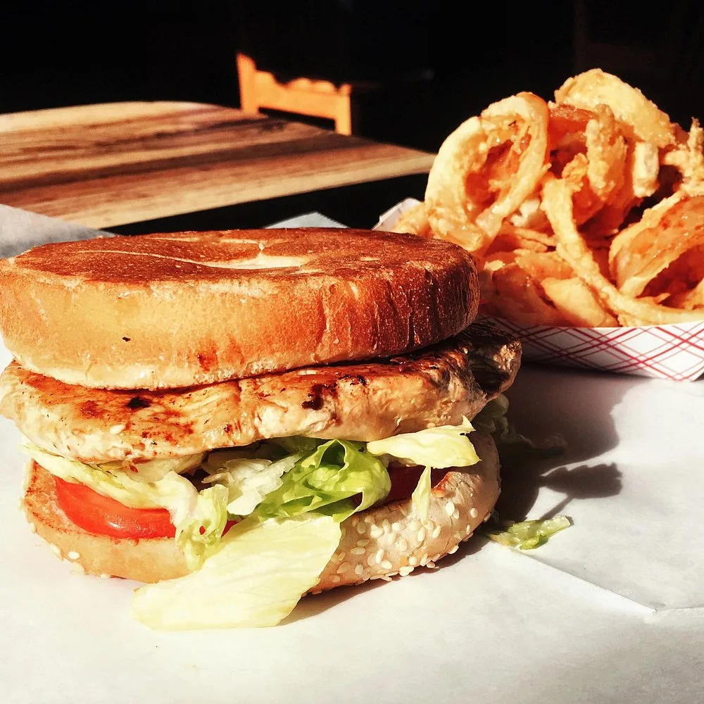 Grilled chicken sandwich with lettuce and tomato