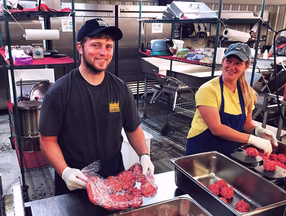 BBQ King employees hand-forming and weighing fresh ground chuck burger patties